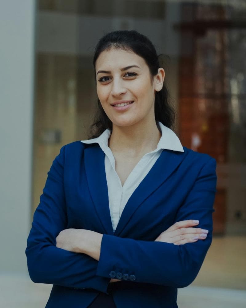 Operations manager standing with arms crossed